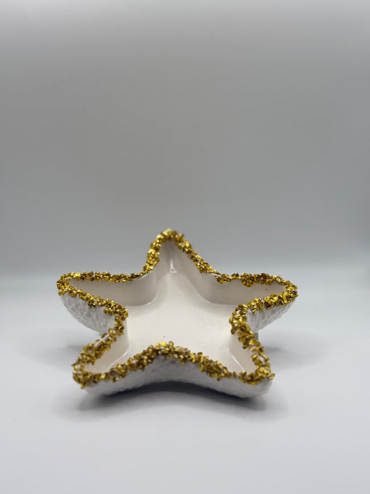 Seestern mit goldenen Steinen